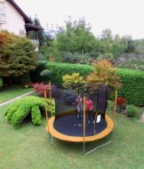 Slika Trampolin LEGONI FUN z zaščitno mrežo 244 cm, oranžen
